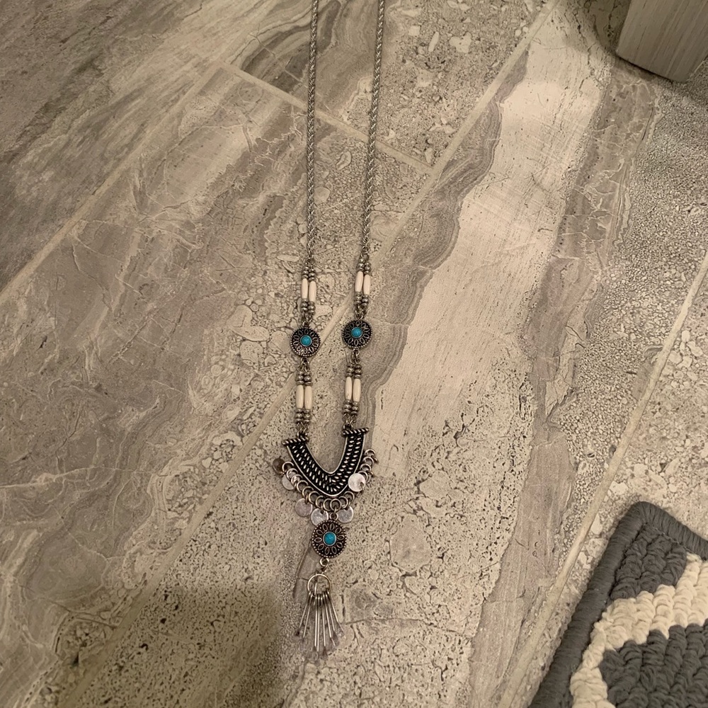 Long silver tribal statement necklace